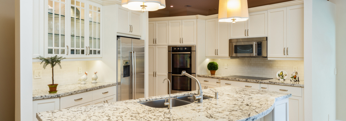 White Kitchen Design with granite worktops